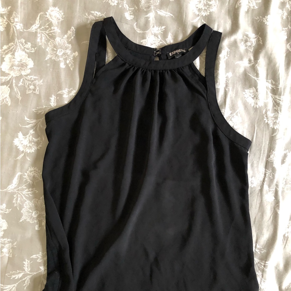 Two black sleeveless shirts.